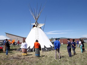 A candlelight vigil put on by Siksika Health Services Thursday afternoon saw around two dozen community members and survivors come together to remember the 215 children discovered buried on the grounds of the former Kamloops Indian Residential School last week and start their own healing journey on the First Nation on Thursday, June 3, 2021.