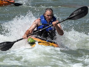 People are seen enjoying a hot day along the Bow River at Harvie Passage. Wednesday, June 2, 2021.