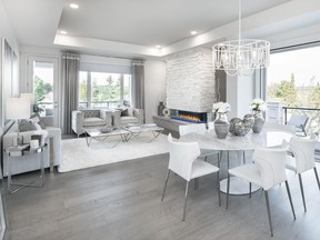 The open concept great room in the Cascade villa by Homes by Avi in Swift Creek (area structure plan).