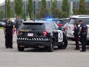Police made several arrests in a busy Calgary Zoo parking lot on Saturday, June 19, 2021.

Gavin Young/Postmedia