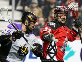 The Calgary Roughnecks Dane Dobbie and the San Diego Seals Eli Gobrecht jostle during National Lacrosse League action in Calgary on Saturday, February 29, 2020.  Gavin Young/Postmedia