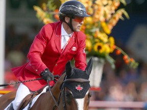 Canada's Eric Lamaze rides Coco Bongo and jumps clear during the first round of the BMO Nations' Cup in the International Ring during The Masters show jumping event at Spruce Meadows in Calgary on Saturday, September 7, 2019.