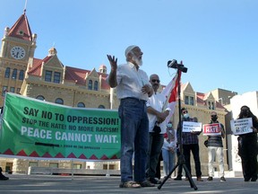 Protestors gather in front of City Hall to stand against Islamophobia  following a series of racist attacks locally and throughout western Canada. Sunday, June 27, 2021.