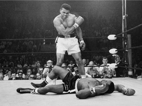 On this day in history in 2016, heavyweight champion Muhammad Ali died. He was 74. 
In this May 25, 1965, file photo, Ali -- then known as Cassius Clay -- stands over challenger Sonny Liston, shortly after dropping Liston with a short hard right to the jaw, in Lewiston, Maine.