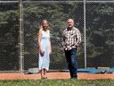 Leanne Ellis and Mark Yobb, both members of the Rutland Park Community Association, pose for a photo in Richmond Green Park.  The two battle the City Hall as the city plans to sell two heavily used baseball diamonds in the park. 