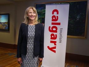 FILE - Cindy Ady Chief Executive Officer of Tourism Calgary speaks during a TV interview prior to the annual general meeting in Calgary  on Wednesday May 24, 2017.