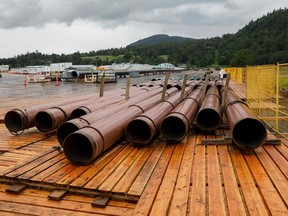 Pieces of the Trans Mountain Pipeline project sit in a storage lot outside of Abbotsford, British Columbia.