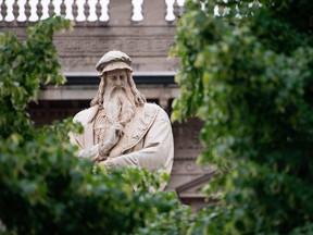 A picture taken in Milan on May 3, 2019, shows a statue of Italian Renaissance genius Leonardo da Vinci done by Italian sculpture Pietro Magni.