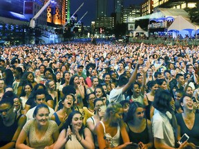Fans fill Place des Festivals to watch Jessie Reyez perform at a free outdoor show at the Montreal International Jazz Festival in Montreal Tuesday, July 3, 2018.
