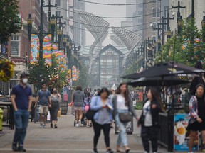 A smoky Stephen Avenue in downtown Calgary on Sunday, July 18, 2021.