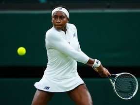 Coco Gauff of the United States, playing partner of Caty McNally of the United States plays a backhand in their Ladies' Doubles Third Round match against Veronika Kudermetova and Elena Vesnina of Russia during Day Eight of The Championships - Wimbledon 2021 at All England Lawn Tennis and Croquet Club on July 06, 2021 in London, England.