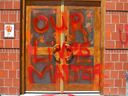 Graffitti and damage is shown at St Bonaventure Catholic Church in Calgary on Thursday, July 1, 2021. Polce say a number of churches were vandalized overnight in Calgary.