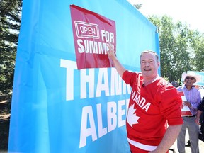 Premier Jason Kenney promotes the government’s “Open for Summer” plan in Calgary on July 1, 2021.