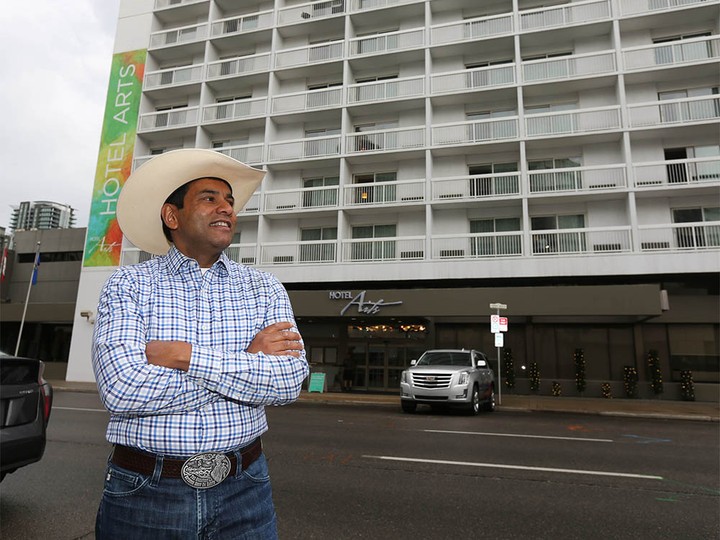  Sol Zia, Executive Director of Calgary Hotels Association, poses in front of Hotel Arts In Calgary on Sunday, July 11, 2021.