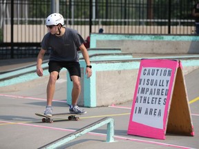 Curtis Ruttle his the bowl at Shaw Millennium Park in downtown Calgary on Saturday, July 24, 2021. Ruttle, Alt Route Projects and a collective of blind and visually impaired skateboarders hit Millennium Park in a partnership with the City of Calgary Parks and Recreation Department to develop adaptive techniques to make skateparks more accessible for those with vision loss.