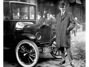 Henry Ford with 1921 Model T. Archived photo, courtesy of Ford Motor Company.