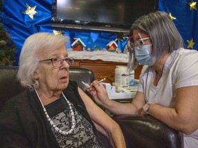 Canada's first recipient of a COVID-19 vaccine Gisèle Lévesque, 89, becomes the first Quebecer and Canadian to receive the COVID-19 vaccine, at CHSLD Saint-Antoine in Quebec City at 11:25 a.m. on Dec. 14, 2020.
