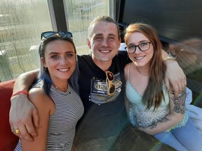 Emerson Wikeruk, the victim of a July 4 hit-and-run on Memorial Drive, appears with two of his four sisters. Wikeruk remains in hospital in a medically-induced coma in serious condition, while Calgary police continue their investigation into the collision.