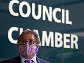 Calgary Mayor Naheed Nenshi speaks with media following the council vote to rescind the mandatory masking bylaw in the city. Mandatory masking for transit and inside city-owned and operated facilities will remain for the time being. Council voted on Monday, July 5, 2021.