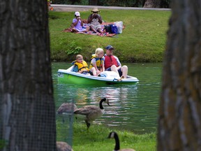 Calgarians enjoyed the tranquil lagoon waters in Bowness Park on Wednesday, July 7, 2021.