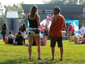 Music fans take in the first night of the Calgary Folk Music Festival’s Summer Serenades Concert Series at Prince’s Island on Thursday, July 22, 2021.