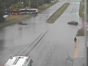 The City of Calgary tweeted this traffic camera image of flooding at 52 Street and 32 Avenue N.E. on Friday. Thunderstorms dropped rain and hail around the city, causing flooding on many roadways.