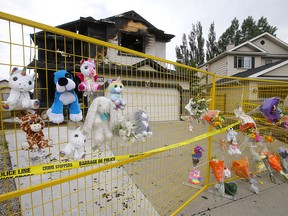 A growing memorial at the scene of a house fire in Chestermere where seven people died. Photo taken on Sunday, July 4, 2021.