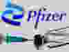 Syringe and vial are seen in front of a displayed Pfizer logo in this illustration taken on June 24, 2021.