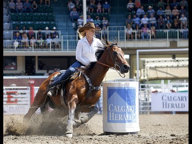 Wenda Johnson from Pawhuska, OK, during the Ladies Barrel Racing event on day 4 of the 2021 Calgary Stampede rodeo on Monday, July 12, 2021. She raced to the top of the standings on Monday.  Darren Makowichuk/Postmedia