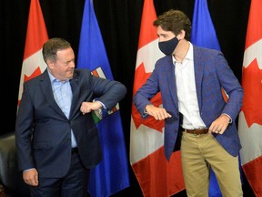 Prime Minister Justin Trudeau meets with Alberta Premier Jason Kenney in Calgary on July 7, 2021.