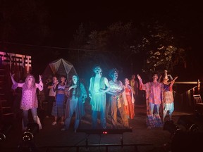Ryan Maschke, centre, and the cast in BrownCow Collective's outdoor performance of Hair.