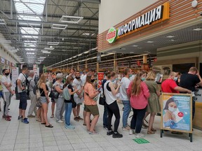 People line up to receive vaccine against the coronavirus disease (COVID-19) at a vaccination centre in the Globus shopping mall in Vladimir, Russia July 15, 2021. Picture taken July 15, 2021.
