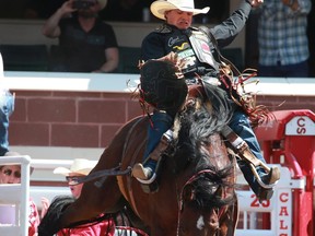 Visalia, Calif., bronc-rider Lefty Holman scored an 85 aboard Don't See You on Tuesday at the Calgary Stampede rodeo.