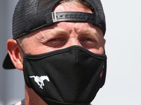 Calgary Stampeders QB Bo Levi Mitchell wears a team branded facemark as he leaves the CFL team's first training camp practice in Calgary on Saturday, July 10, 2021. Jim Wells/Postmedia