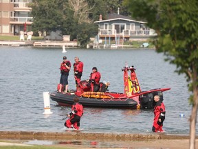 Chestermere Fire Department, EMS and RCMP responded to the lake, east of Calgary, at approximately 3 p.m. Monday after reports that two men were having trouble swimming to shore. Al Charest/Postmedia