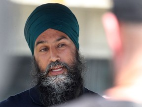 NDP Leader Jagmeet Singh speaks to reporters at the East Village Beer Garden before meeting with the Calgary and District Labour Council. Saturday, July 17, 2021.