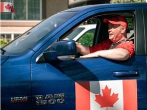 Alberta Premier Jason Kenney changed his Twitter profile picture to show him at the wheel of his Dodge Ram 1500 after firing back at a Globe and Mail opinion piece calling pickups a plague on the roads of the nation.