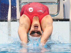 Tokyo 2020 Olympics - Swimming - Women's 100m Backstroke - Heats - Tokyo Aquatics Centre - Tokyo, Japan - July 25, 2021. Kylie Masse of Canada in action