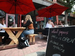Patrons enjoy the Without Papers Pizza sidewalk patio in Inglewood on Monday, July 19, 2021.