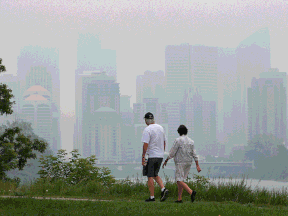 Smoke from B.C. and Saskatchewan wildfires continues to shroud Calgary on Monday, July 19, 2021.