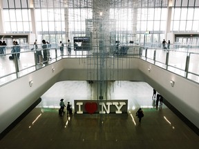 People move through LaGuardia Airport on July 2, 2021 in New York City.