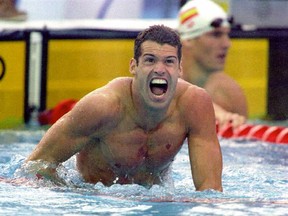 Mark Tewksbury after his Olympic win in Barcelona in 1992. Postmedia file photo.