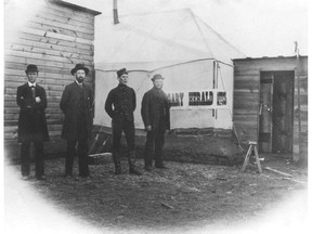 The Herald had its beginnings in 1883 in this tent. From left are George Rouleau, a Calgary lawyer; Andrew Armour, a founder of The Herald; North West Mounted Police Constable Thomas Clarke, who helped set type; and Thomas Braden, the other founder of The Herald. The Calgary Herald, Mining and Ranche Advocate and General Advertiser, as the paper was grandly called, made its debut on August 31, 1883. Working with a hand-operated press and a small supply of type, Armour and Braden turned out a four-page tabloid paper every week from this tent, about 14 feet by 20, on the banks of the Elbow River. Calgary Herald archive photo.