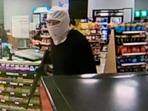 Innisfail RCMP believe the same suspect, pictured here in CCTV footage, robbed the Fas Gas convenience store located at 5107 50 Street in Innisfail on two separate occasions. The robberies happened on Aug. 26 and Aug. 28, 2021. He is also linked to a third robbery.