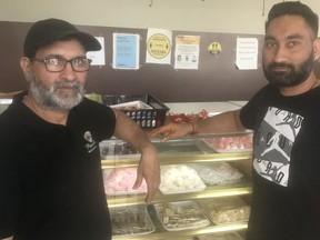 Sukhdev Singh and son Lucky at the family-run Punjab Chulha sweet shop in Martindale. Photo supplied by Gerry Garvey.