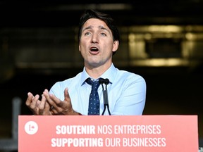 Liberal Leader Justin Trudeau gives a news conference after visiting ETI Converting Equipment during his election campaign tour in Longueuil, Que., Aug. 16, 2021.