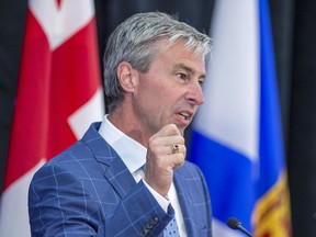 Progressive Conservative Premier-designate Tim Houston fields questions at a media availability after winning a majority government in the provincial election in New Glasgow, N.S. on Wednesday, Aug. 18, 2021.