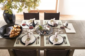 This tablescape by Pottery Barn helps set the scene for a warm meal with family and friends.