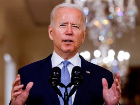 FILE PHOTO: U.S. President Joe Biden delivers remarks on Afghanistan during a speech in the State Dining Room at the White House in Washington, U.S., August 31, 2021.