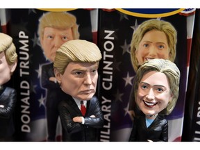 Bobblehead dolls of former U.S. president Donald Trump and Democratic presidential nominee Hillary Clinton. 
Robyn Beck/AFP/Getty Images